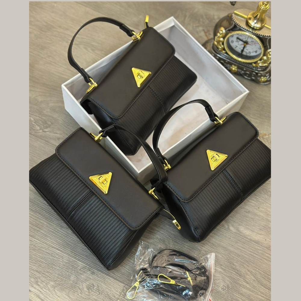 Bags 72 Black Triangle Lock Mini Handbag - Image 1